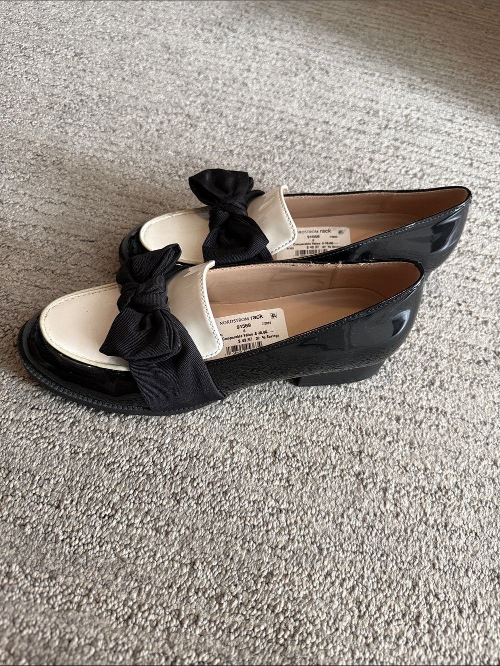Bandolino Black and Cream Bow-Accent Patent Loafers